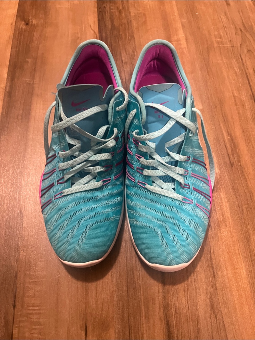 Nike Women’s Turquoise Athletic Shoes with Pink Accents
